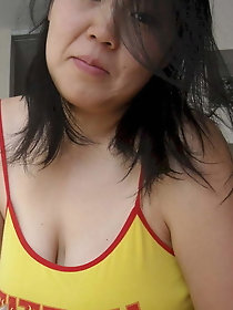 Small asian Selfie lady braless And teases